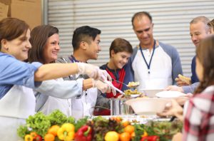 Chef Volunteers Serving Food