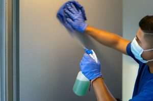 Cleaning Staff Disinfecting Restrooms