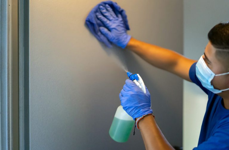 Cleaning Staff Disinfecting Restrooms