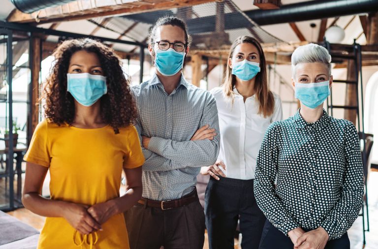Diverse Employees Wearing Masks Workplace