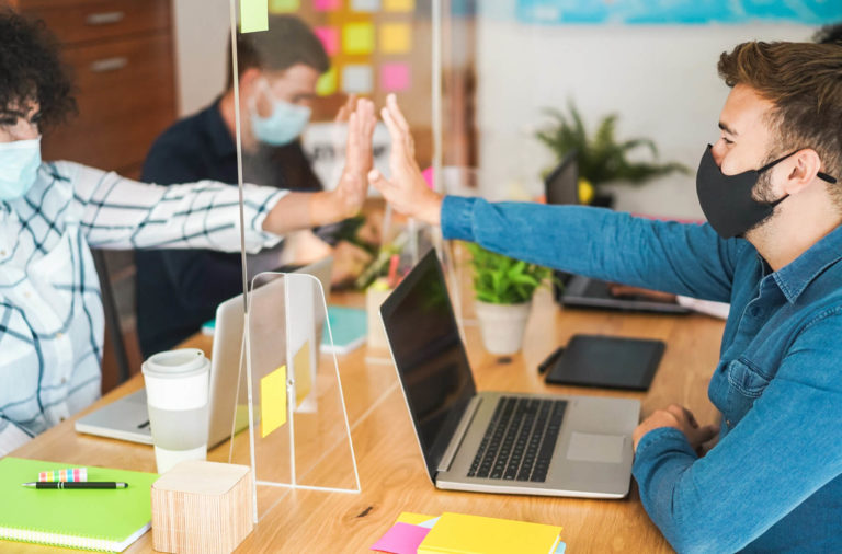 Employee Social Distance behind Plexiglass