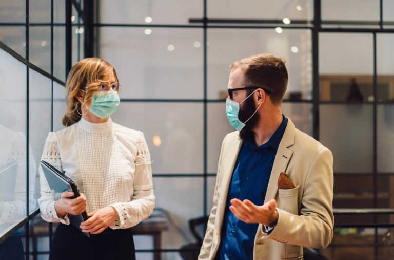 Employees with Mask Returning to Office