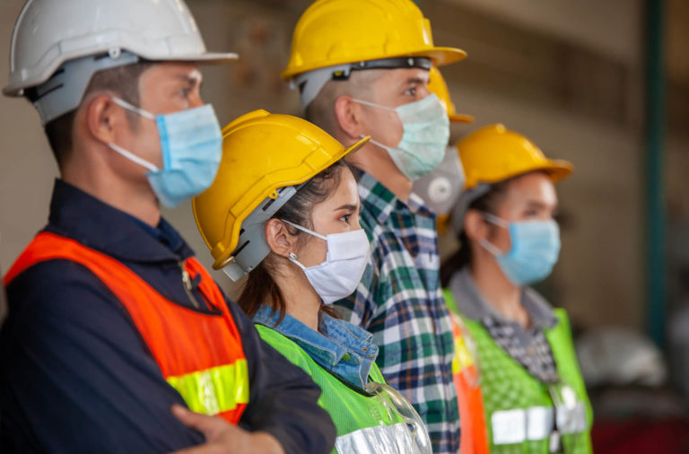 Safety Workers Wearing Protective Face Masks