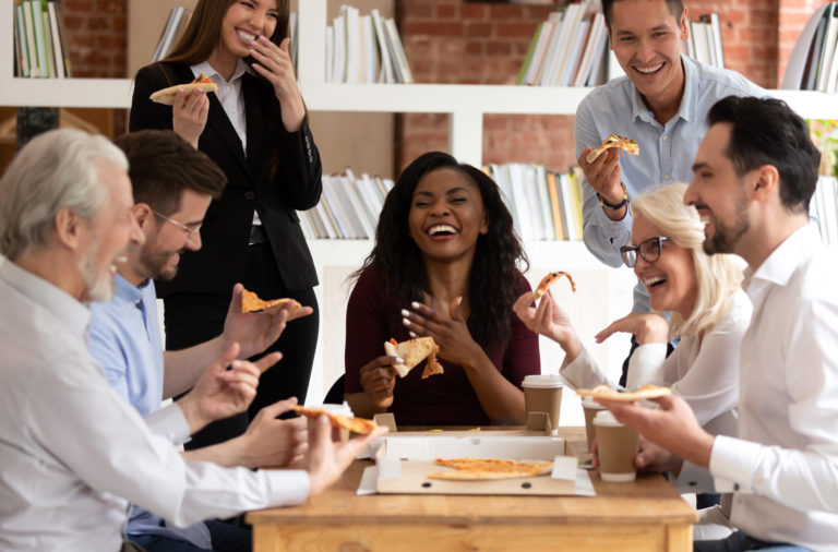 Workplace Employees Laugh Share Pizza