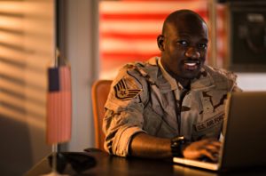 American Veteran Soldier on Laptop