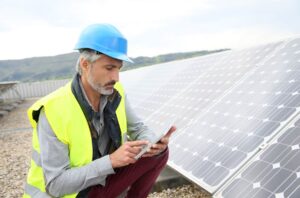 Engineer with Solar Power Panels