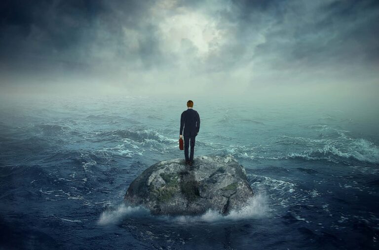 Operational Resiliency: A step beyond sustainability Businessman on Rock Island in Hurricane