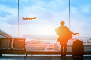 Traveler Waiting for Flight at Airport
