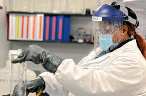 Laboratory Tech Measures Liquid Laboratory Tech Measures Liquid