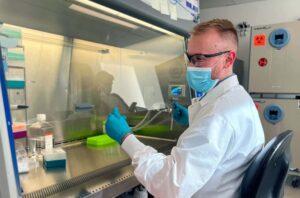 Lab Tech Cleaning Fume Hood