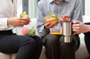Employees with Sandwiches at Lunch