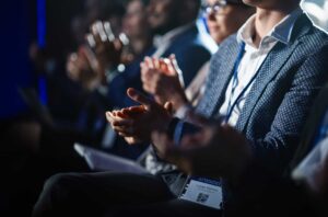 Hands Clapping at Conference