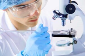 Scientist Laboratory Microscope