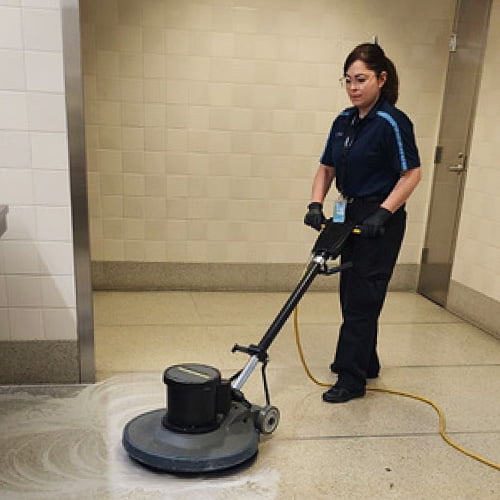 Janitor with Floor Scrubber