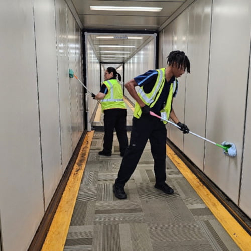 Janitors Cleaning Airport Jetway