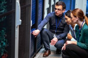 IT Engineer Explaining Server
