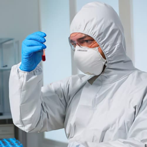 Cleanroom Employee with Test Tube